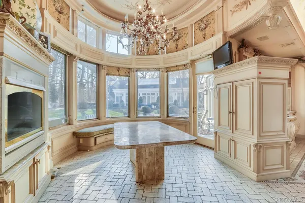 a very nice looking living room with a large window