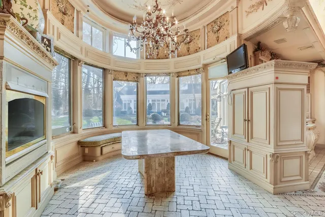 a very nice looking living room with a large window