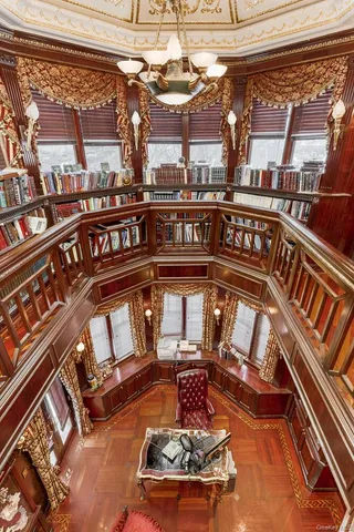 a view of a fireplace with wooden floor