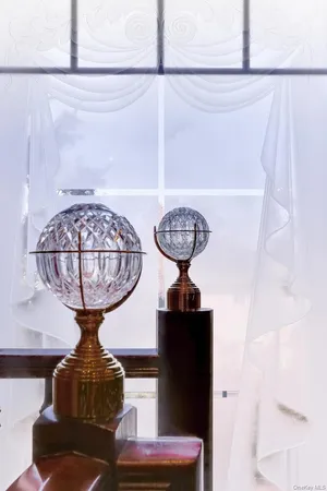 a picture of a living room with a lot of white furniture and chandelier