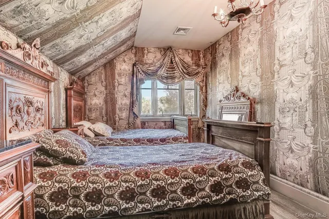 a swimming pool with outdoor seating and yard