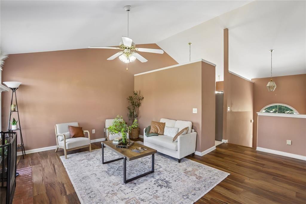 9720 Poole Road Villa Rica, GA 30180 - Photo 7 of 40 a living room with furniture and wooden floor