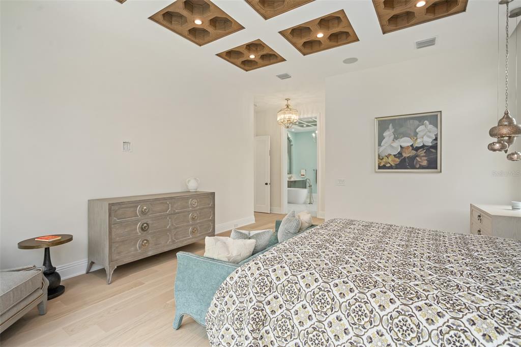 10065 Autumn Mist Lane Orlando, FL 32836 - Photo 14 of 65 a bedroom with a bed and cabinets