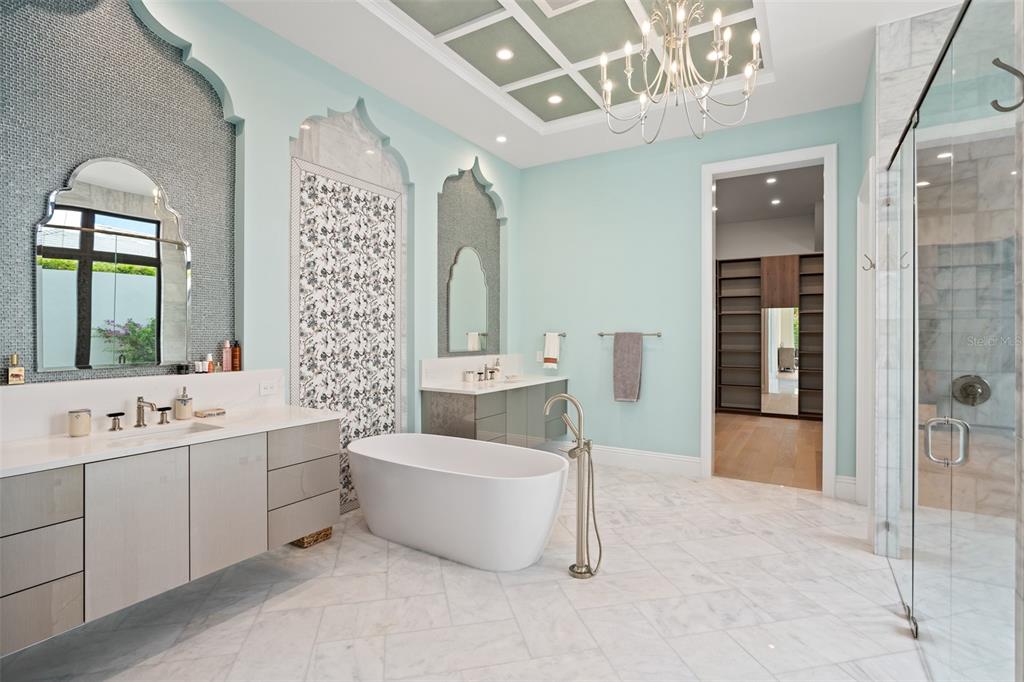 10065 Autumn Mist Lane Orlando, FL 32836 - Photo 15 of 65 a spacious bathroom with a double vanity sink mirror and bathtub