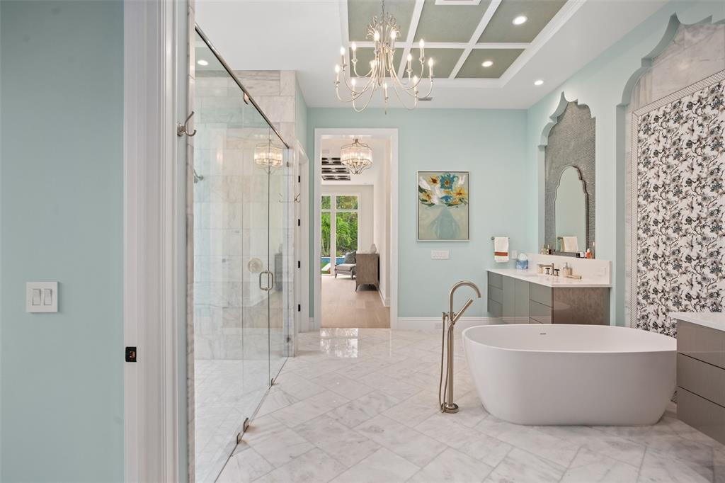 10065 Autumn Mist Lane Orlando, FL 32836 - Photo 18 of 65 a spacious bathroom with a tub a double vanity sink and shower