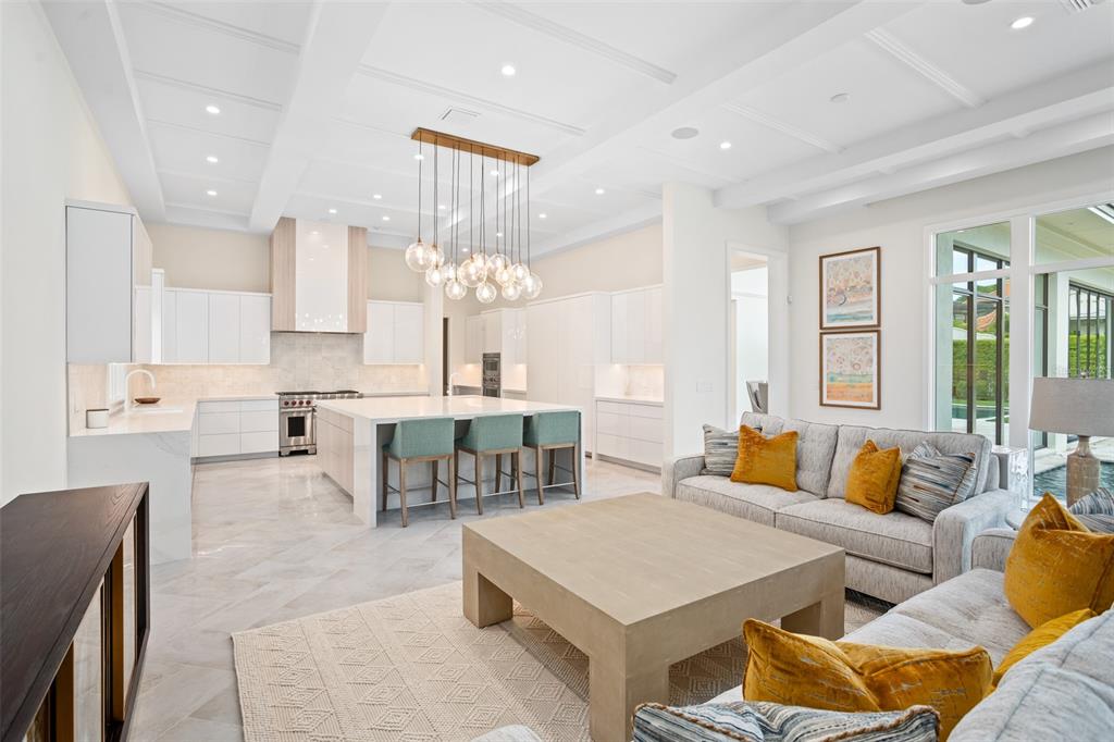 10065 Autumn Mist Lane Orlando, FL 32836 - Photo 23 of 65 a living room with furniture a rug and a chandelier