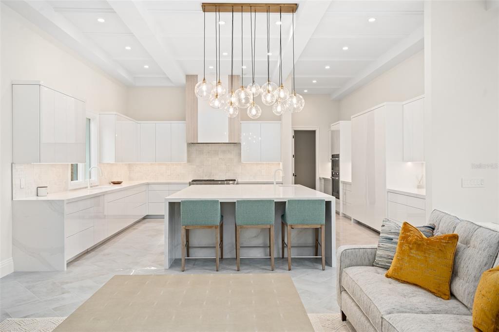 10065 Autumn Mist Lane Orlando, FL 32836 - Photo 24 of 65 a large kitchen with kitchen island a sink stainless steel appliances and cabinets