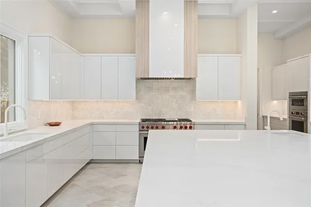 a view of livingroom with furniture and large window