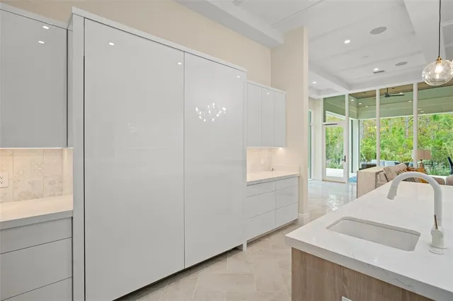 a bathroom with a tub and sink