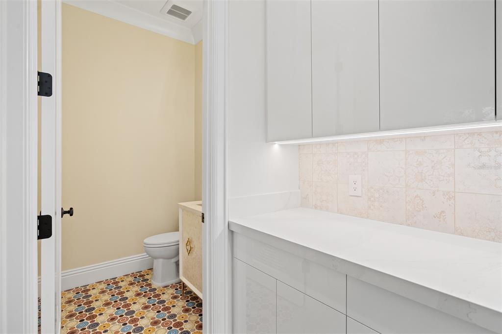 10065 Autumn Mist Lane Orlando, FL 32836 - Photo 31 of 65 a bathroom with a bathtub and toilet