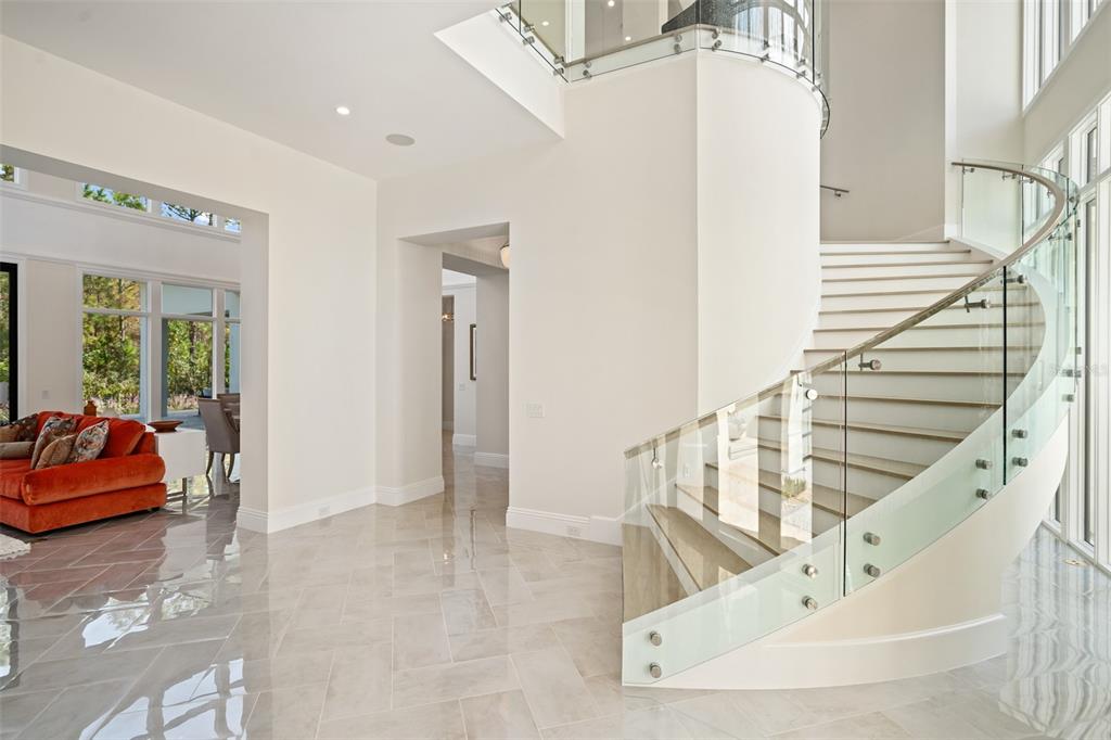 10065 Autumn Mist Lane Orlando, FL 32836 - Photo 4 of 65 a view of a living room and entryway