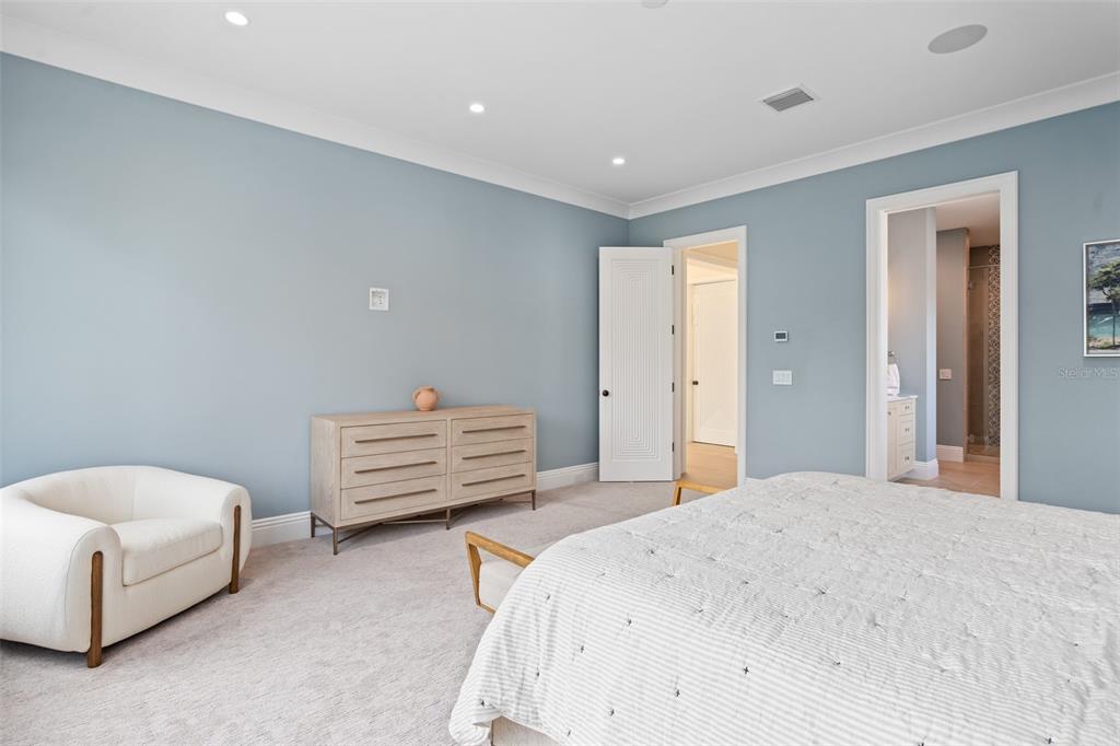 10065 Autumn Mist Lane Orlando, FL 32836 - Photo 41 of 65 a bedroom with a bed and a couch