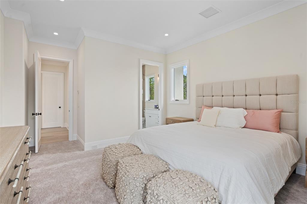 10065 Autumn Mist Lane Orlando, FL 32836 - Photo 48 of 65 a bedroom with a bed and a walk in closet