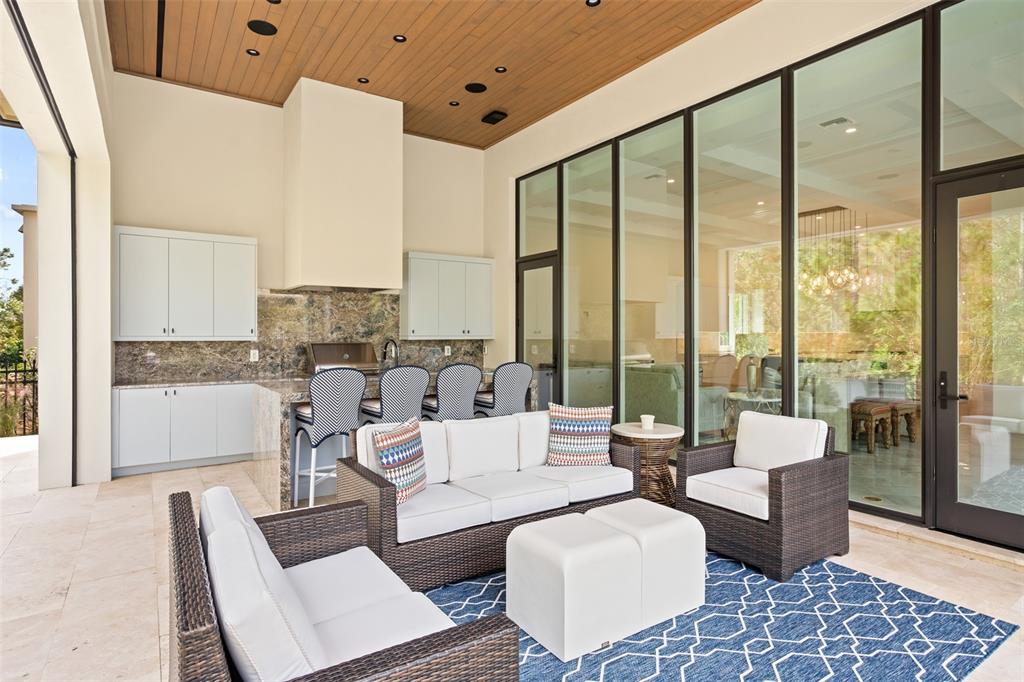 10065 Autumn Mist Lane Orlando, FL 32836 - Photo 50 of 65 a living room with furniture and a large window