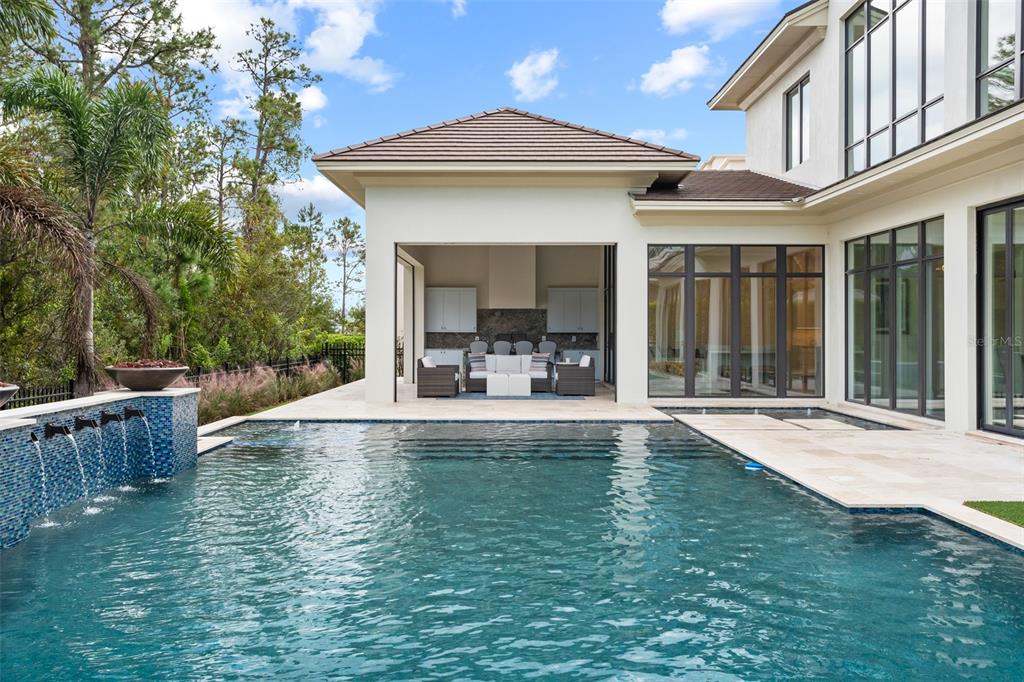 10065 Autumn Mist Lane Orlando, FL 32836 - Photo 57 of 65 a view of a house with pool yard and porch