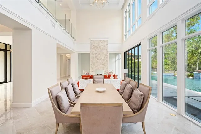 a spacious bedroom with a bed and a large window