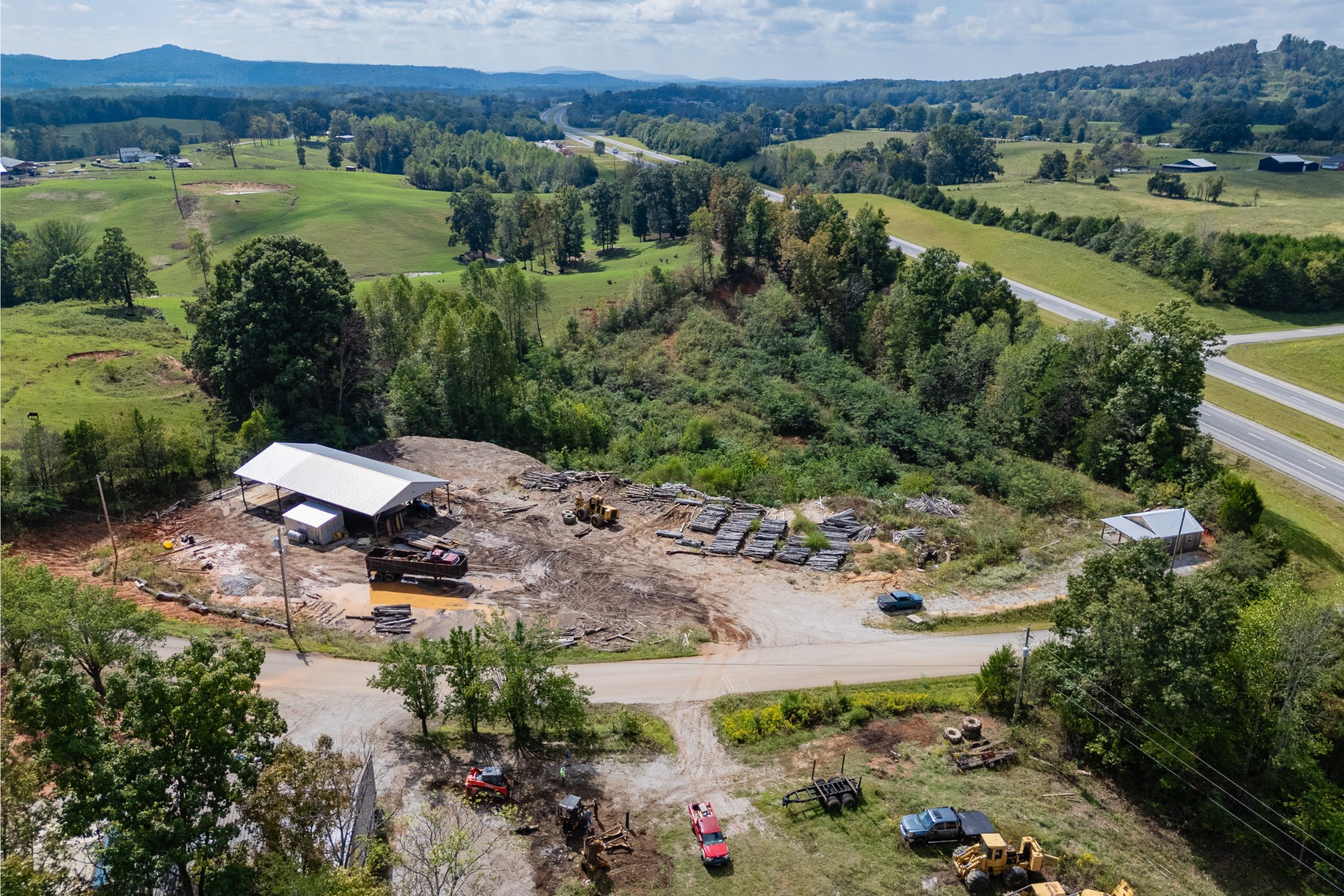 0 Old Stage Coach Road Quebeck, TN 38579 - Photo 12 of 18 an aerial view of green landscape with trees houses and mountain view