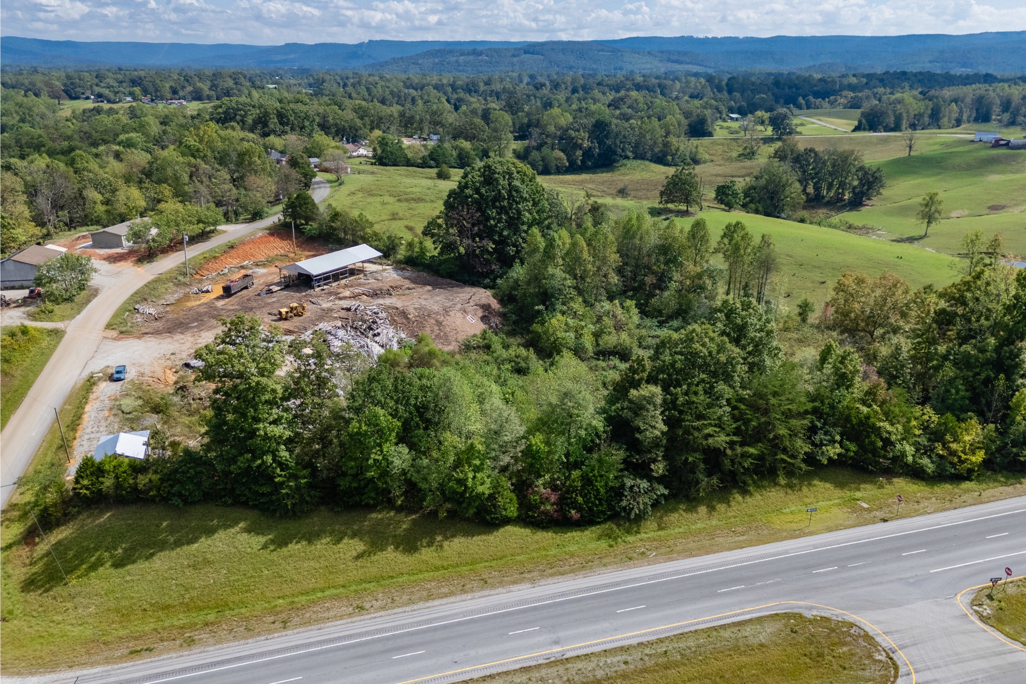 0 Old Stage Coach Road Quebeck, TN 38579 - Photo 16 of 18 a view of a yard with a wooden fence