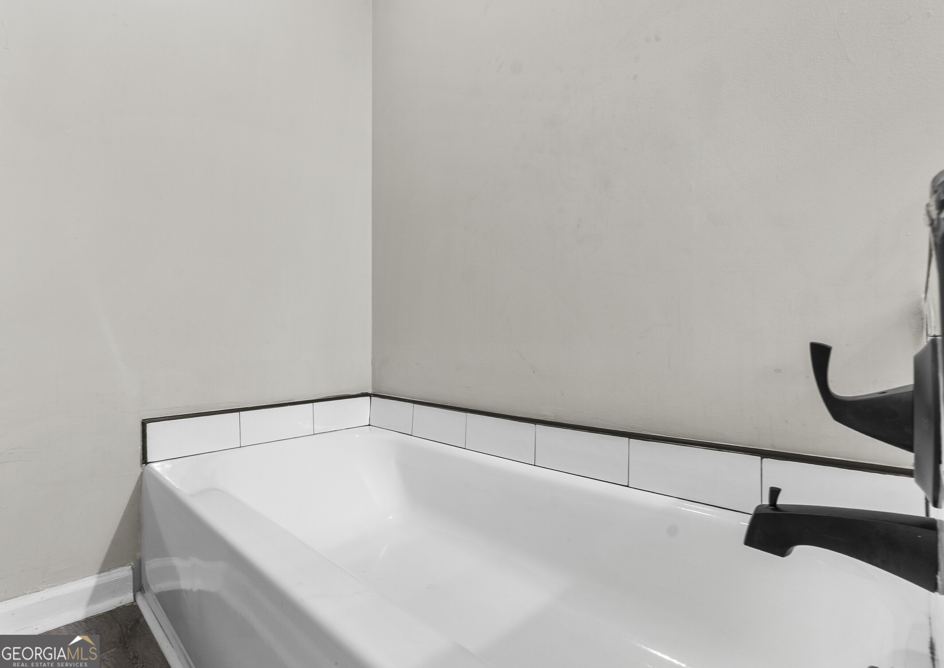 1412 Johnson Road Macon, GA 31220 - Photo 39 of 53 a view of a room with racks on the wall