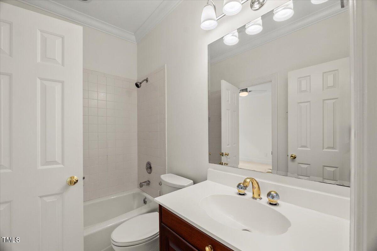 4016 Edward Pride Wynd Raleigh, NC 27612 - Photo 46 of 69 a bathroom with a sink a toilet and shower