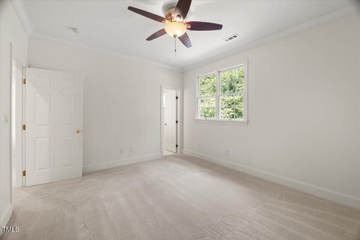 4016 Edward Pride Wynd Raleigh, NC 27612 - Photo 47 of 69 a view of an empty room with a window