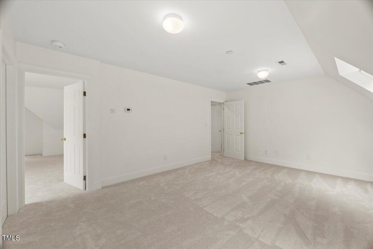 4016 Edward Pride Wynd Raleigh, NC 27612 - Photo 56 of 69 a view of an empty room