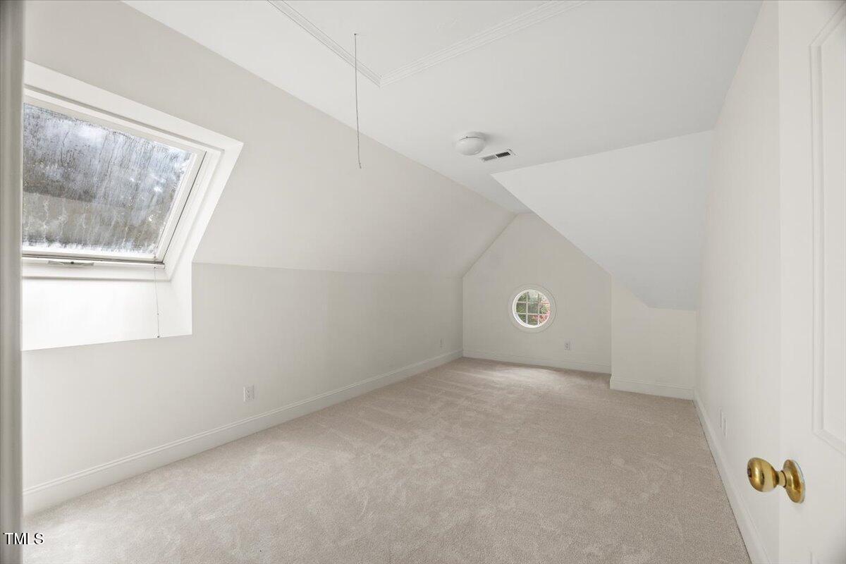 4016 Edward Pride Wynd Raleigh, NC 27612 - Photo 58 of 69 a view of an empty room with a window