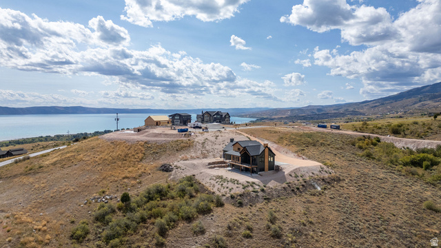 300 Knoll Loop, Unit 227 Fish Haven, ID 83287 - Photo 49 of 56 Aerial view of property and surrounding area featuring a water and mountain view