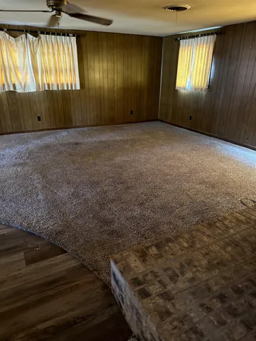 a view of an empty room and window