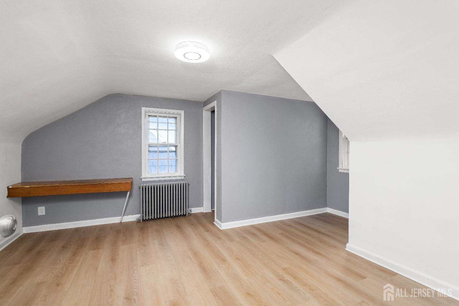 225 Kuser Road Hamilton, NJ 08619 - Photo 18 of 26 an empty room with windows