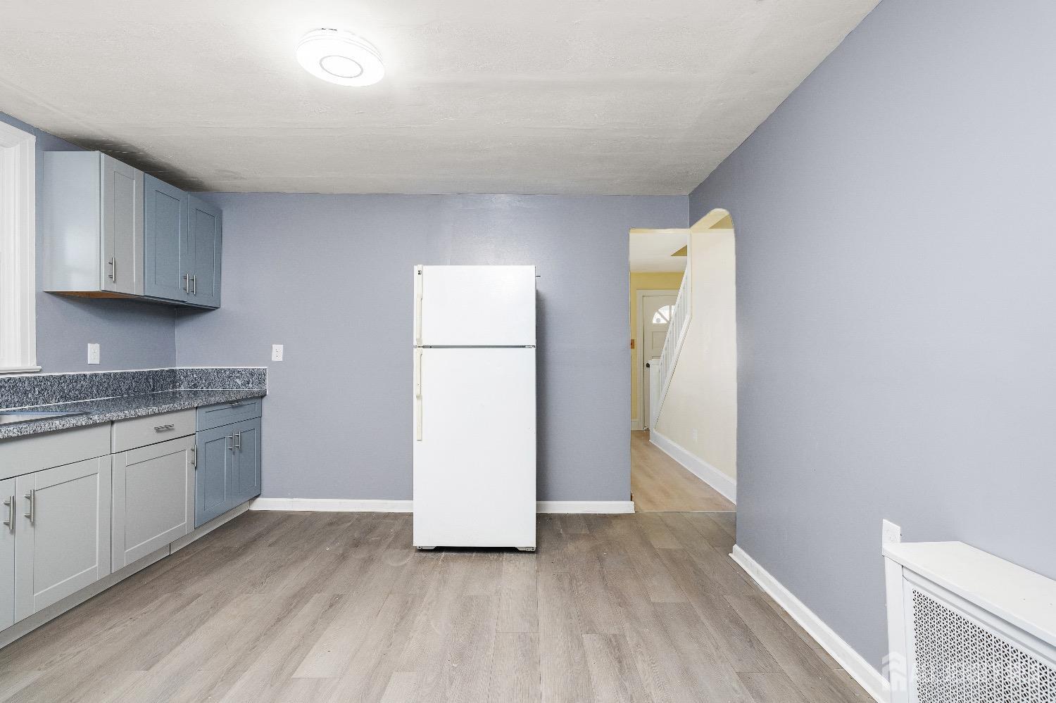 225 Kuser Road Hamilton, NJ 08619 - Photo 9 of 26 a view of a kitchen with a sink and a refrigerator