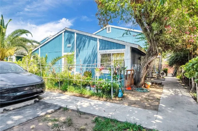 a house view with a garden space