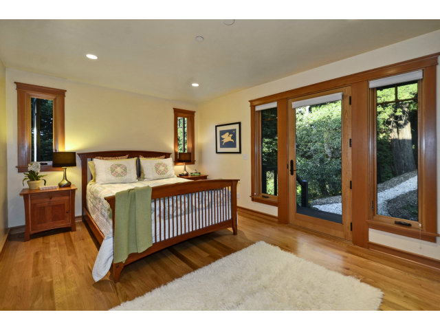 240 Gillette Road Aptos, CA 95003 - Photo 16 of 24 a bedroom with a bed and a large window