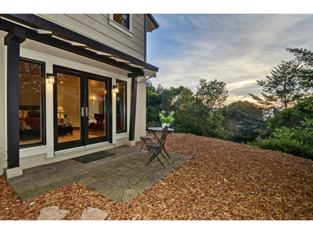 240 Gillette Road Aptos, CA 95003 - Photo 22 of 24 a backyard of a house with yard and outdoor seating