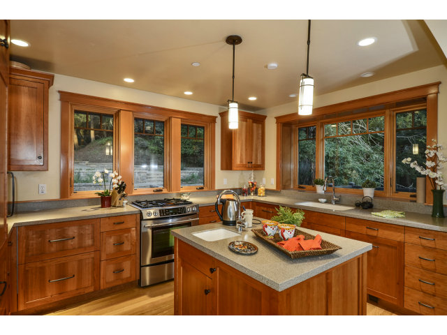 240 Gillette Road Aptos, CA 95003 - Photo 9 of 24 a kitchen with a sink stove and cabinets