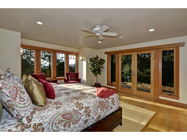 240 Gillette Road Aptos, CA 95003 - Photo 10 of 24 a bed room with a bed and a large window