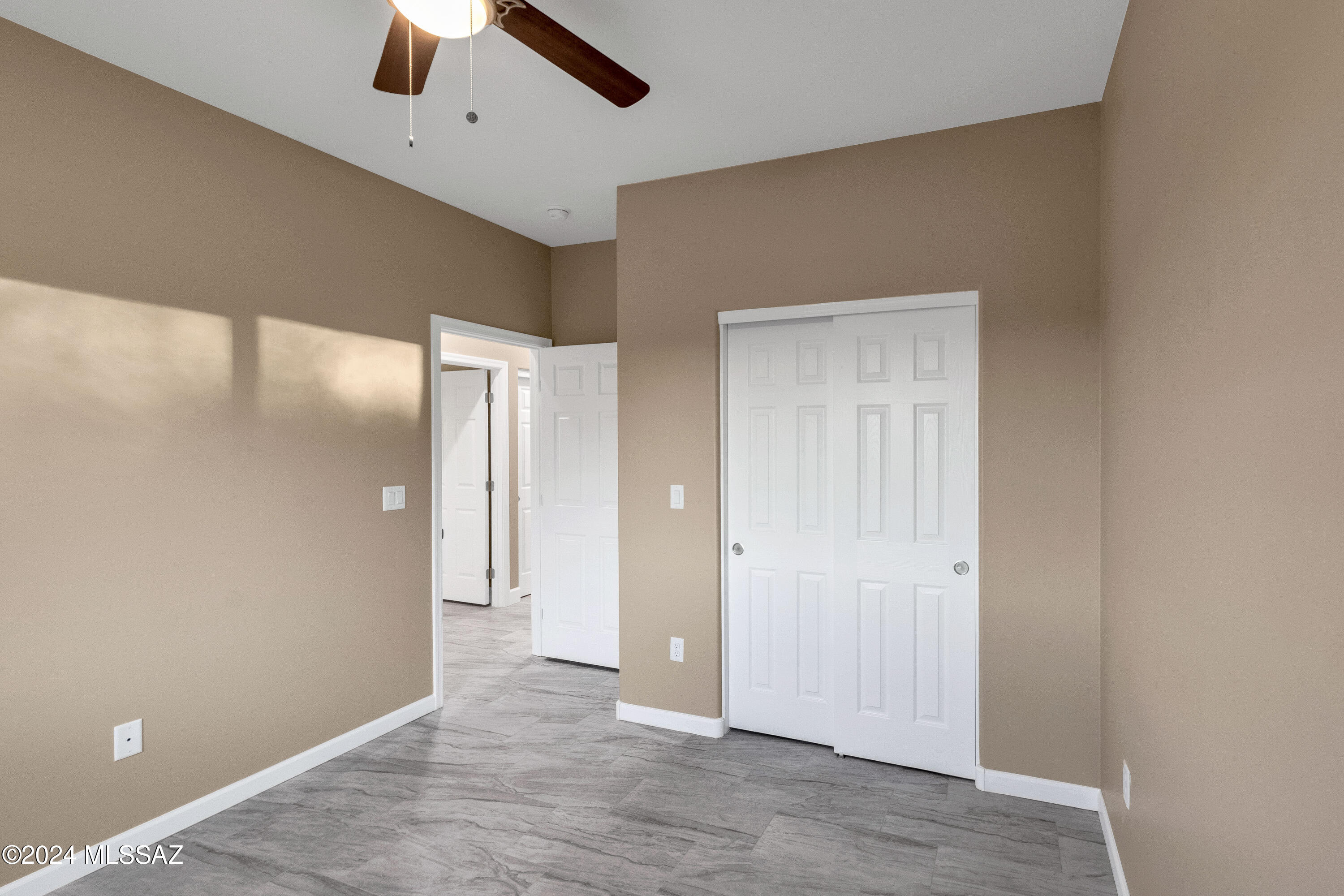 221 Paseo Mascota Rio Rico, AZ 85648 - Photo 29 of 45 wooden floor in an empty room