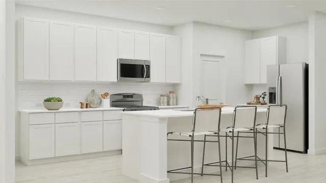 a kitchen with stainless steel appliances kitchen island granite countertop a table and chairs