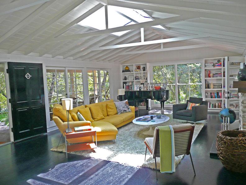 2860 East Valley Road Montecito, CA 93108 - Photo 4 of 14 a living room with furniture and a floor to ceiling window