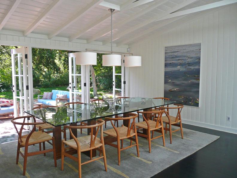 2860 East Valley Road Montecito, CA 93108 - Photo 5 of 14 a view of a dining room with furniture large windows and wooden floor