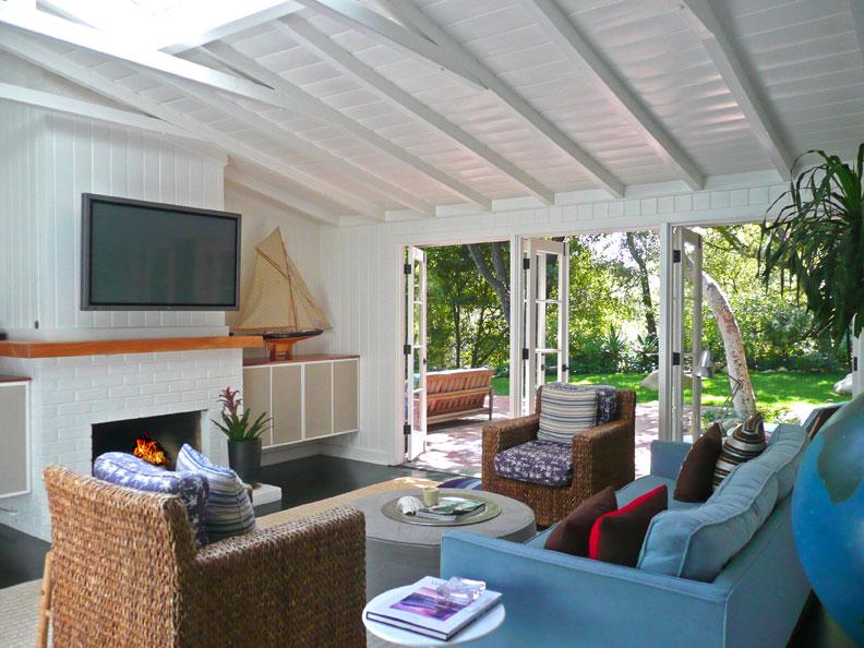 2860 East Valley Road Montecito, CA 93108 - Photo 6 of 14 a living room with furniture a fireplace and a flat screen tv
