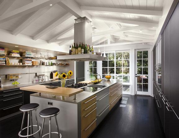 2860 East Valley Road Montecito, CA 93108 - Photo 7 of 14 a kitchen with a stove a refrigerator and wooden floor