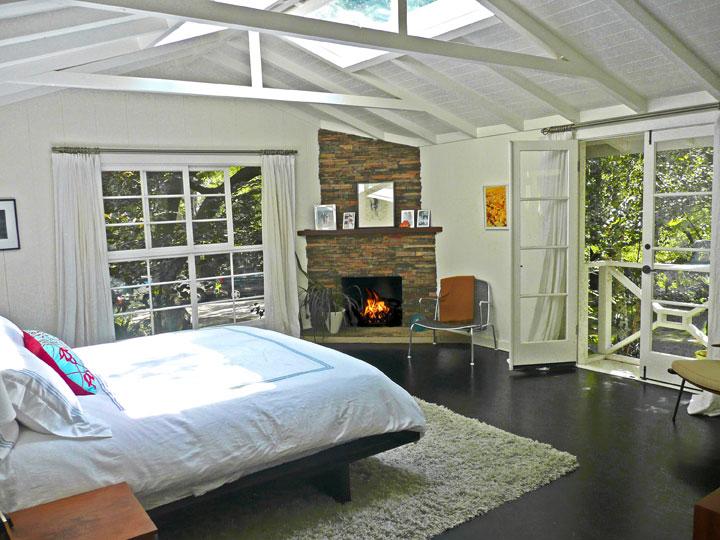 2860 East Valley Road Montecito, CA 93108 - Photo 9 of 14 a bed sitting in a spacious bedroom next to a window