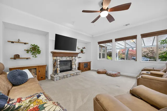 a kitchen with granite countertop a stove and a refrigerator