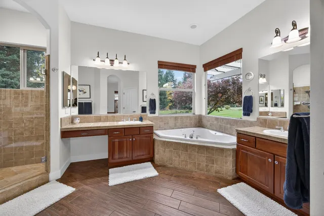 a view of a swimming pool and a yard