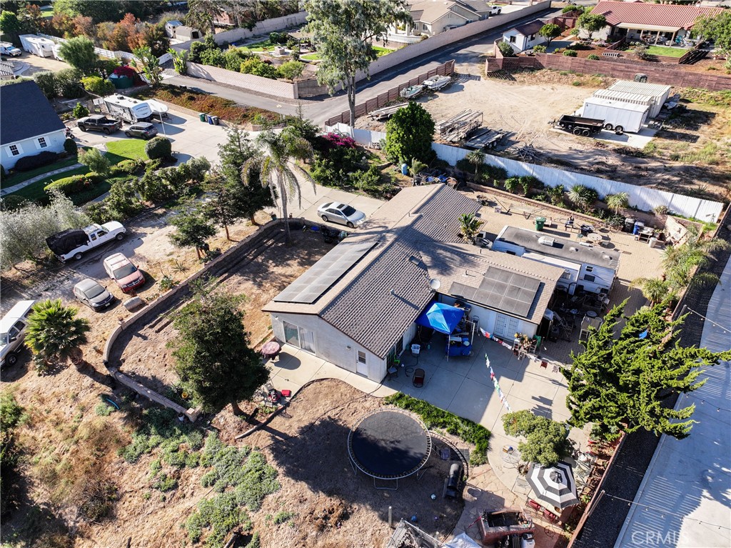1418 Solomon Road Santa Maria, CA 93455 - Photo 21 of 27 an aerial view of a house with a garden and lake view