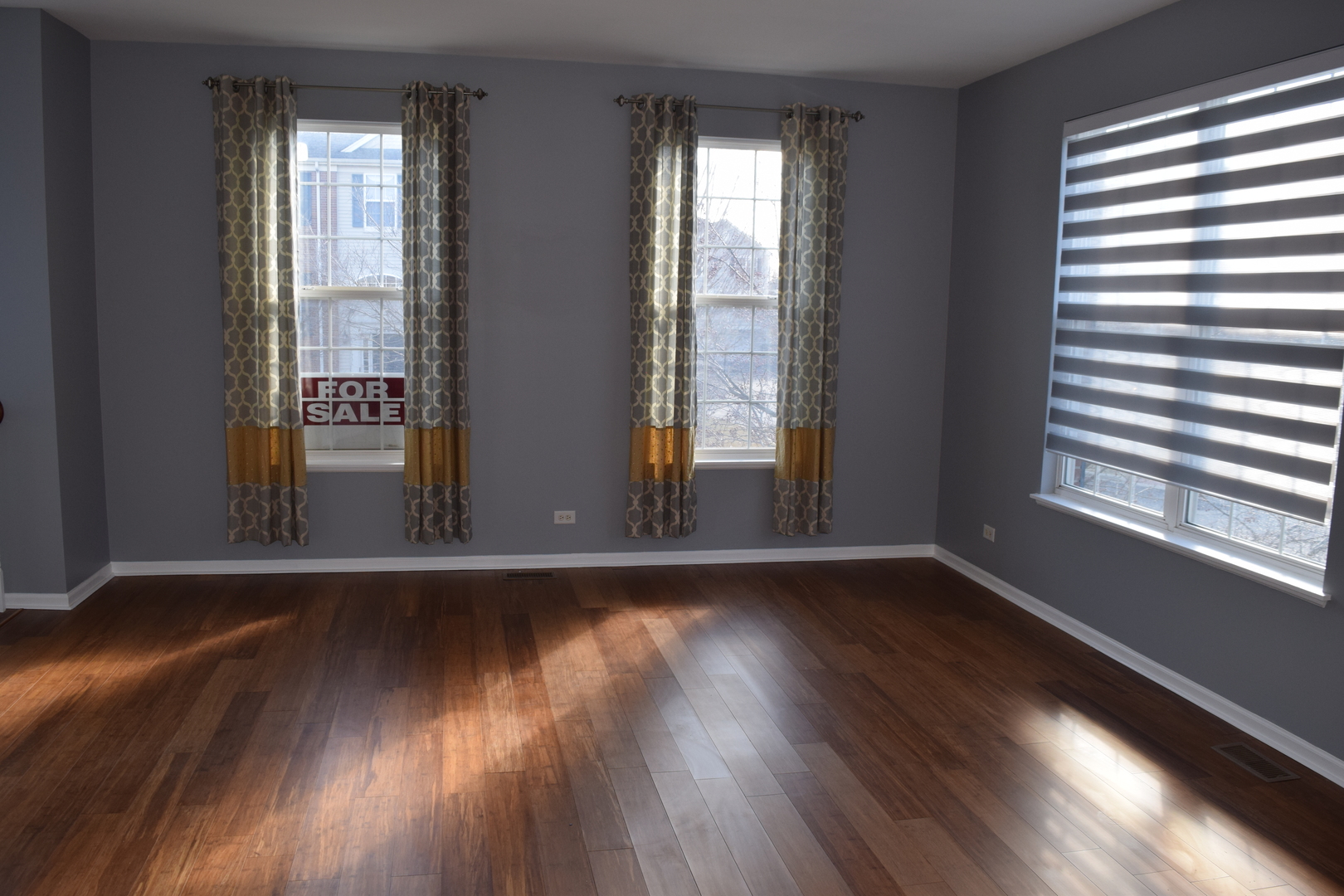 4110 Bethlehem Road Aurora, IL 60504 - Photo 15 of 53 a view of an empty room with wooden floor and a window