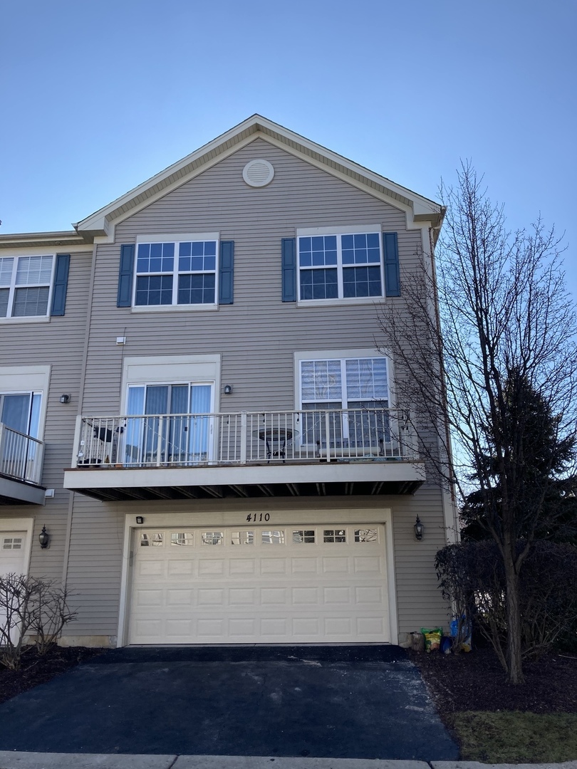 4110 Bethlehem Road Aurora, IL 60504 - Photo 2 of 53 a front view of a building with glass windows