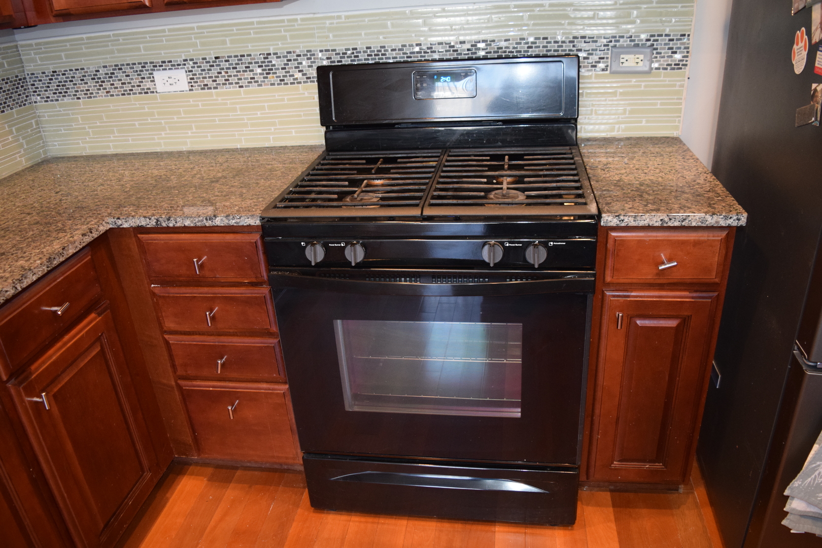 4110 Bethlehem Road Aurora, IL 60504 - Photo 24 of 53 a stove top oven sitting inside of a kitchen