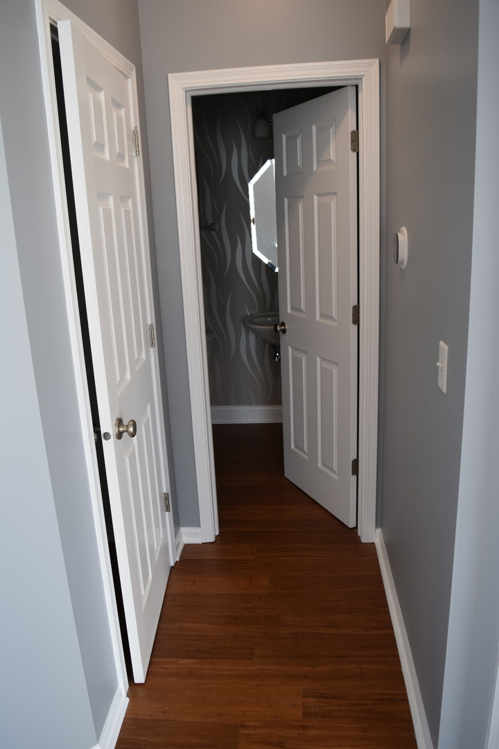 4110 Bethlehem Road Aurora, IL 60504 - Photo 25 of 53 a view of a hallway with wooden floor and entryway